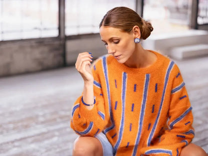 Strikkekit: Khepri – sweater med billemotiv (garn + gratis opskrift)